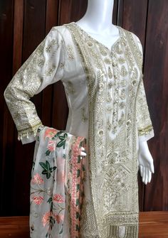 Gulaal Replica Embroidered Pakistani Chiffon dress. Semi Pure Chiffon Embroidered Front, Back, and Sleeves. Semi Pure Chiffon Embroidered Front and Back Borders. Raw Silk Trouser With Embroidery Work. Four Side Border Semi Pure Chiffon Heavy Embroidered Dupatta. Color: There might be slight color variation due to lighting and flashes while the photo shooting. The color may also vary because of different screen resolutions. Wash Care: Dry Clean Only. Note: This is a replica dress of the original branded dress. Hence, it will not be 100% the same as the 1st model picture. Please see the additional pictures of the replica dress for 100% accuracy. Please contact us if you have any questions. Branded Dress, Punjabi Boutique, Side Border, Mens Sherwani, Indian Kurta, Embroidered Chiffon, Pure Chiffon, Embroidered Dupatta, Silk Trousers