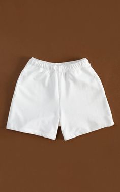 Cozy and consciously made, our 100% Organic Traceable Cotton Sweatshorts are the perfect intersection of sustainability and street style. LEARN MORE → certified organic fibre→ free from toxic substances like bleach & formaldehyde→ colored with nontoxic dyes→ water and energy are monitored→ manufactured in safe working conditions MeasurementsSizes: XS, S, M, L, XL, XXLColor: Off-white SIZE CHART White Cotton Athletic Shorts With Elastic Waistband, Basic White Bottoms With Built-in Shorts, Relaxed Fit White Bottoms With Built-in Shorts, White Cotton Athletic Shorts With Built-in Shorts, Casual White Cotton Shorts, Basic Relaxed Fit Shorts, White Cotton Shorts For Loungewear, Basic Cotton Shorts For Summer, Basic Relaxed Fit Summer Shorts