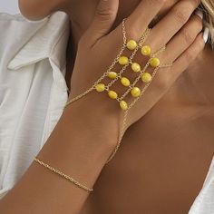 Material: Natural Stone Color: Yellow Fashion Element: Chain Style: Europe and America Summer Silver Alloy Bracelets, Bohemian Gold Alloy Bracelets, Party Jewelry Beaded Alloy, Party Jewelry With Beaded Alloy, Gold Alloy Body Jewelry Gift, Adjustable Clavicle Chain Jewelry For Party, Party Beaded Alloy Jewelry, Adjustable Clavicle Chain For Parties, Elegant Beach Jewelry Made Of Alloy