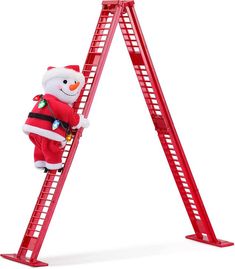 a red ladder with a snowman on it and a santa clause outfit hanging from the top