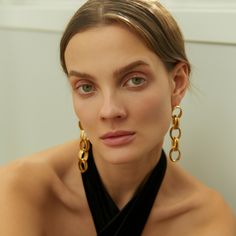 Perfect your look with a pair of luxe gold chain earrings. With their minimalist, eye-cathing design, the delicate and sophisticated Neith Chain Earrings will add an instant touch of glamour to your everyday look.  Handcrafted with 24k Gold plated brass Nickel, lead and cadmium free Earring pins are made of gold plated 925 silver which are non-allergenic Suitable for pierced ears Care To prevent oxidization and maintain long durability, keep your jewelry free of perfume, lotions, and sprays while using. It is advised to remove your gold-plated jewelry before showering. Make sure to store each piece of jewelry in the jewelry case provided or wrapped up in a soft cloth to prevent scratching. It is recommended to gently wipe the surface of your gold-plated jewelry after each use with a non-ab Elegant Cable Chain Jewelry For Party, Elegant Party Jewelry With Cable Chain, Elegant Matte Gold Earrings For Party, Minimalist Yellow Gold Earrings For Evening, Modern Chain Earrings As Gift, Elegant Matte Gold Party Earrings, Modern Linear Drop Earrings For Evening, Evening Metal Chain Earrings, Modern Chain Drop Earrings