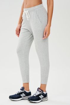 Our best-selling classic cropped sweatpant in ultra luxe fleece, Reena will become your go to piece for every day wear. Pair it with the Warm Up Fleece Pullover and enjoy effortless fit and pure comfort. BEST FOR: Chilling out after running, yoga, CrossFit, barre, Pilates, cycling and spin class. Model is 5'10" and wears a size small. Sportswear Sweats With Elastic Waistband For Lounging, Cozy Joggers For Jogging, Cozy Casual Activewear With Pockets, Cozy Activewear With Pockets For Lounging, Cozy Sweatpants With Elastic Waistband For Jogging, Cozy Fit Sportswear Sweats For Loungewear, Comfy Sweatpants With Ribbed Waistband For Loungewear, Everyday Athleisure Sweats With Pockets, Comfy Loungewear Sweatpants With Ribbed Waistband