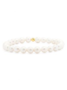 A new take on our classic everyday stretch bracelet. This bracelet is made with 5.8mm freshwater pearls and a single 4mm gold fill bead. It's always a party on your wrist when you add these leMel gold fill stretch beaded bracelets to your wrist stack! Perfect to wear alone or with your other leMel favorites! Measure 6.5" in length. E-mail us for a custom size. Please allow 1-2 weeks for delivery. Classic Everyday Beaded Bracelets With Pearl Charm, Single Strand Pearl Bracelet With Round Beads, Adjustable Stackable Pearl Bracelet, Elegant Pearl White Beaded Bracelets With 8mm Beads, Single Strand Round Pearl Bracelet, Elegant Pearl White Stretch Bracelet, Stackable Pearl Bracelets With Round Beads, Classic Everyday Pearl Bracelet With Pearl Charm, Elegant White Beaded Bracelets With 8mm Beads