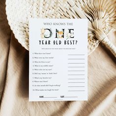 a card that says, who knows the one year old best? on top of a basket