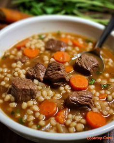 a white bowl filled with meat and barley soup