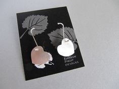 "These earrings are perfect for Valentine's day or any or any gift occasion. I cut the hearts out of sterling silver sheet with my little saw and gave them a soft brushed surface. The ear wires are handmade of sterling silver with a little ball at the end which shows at the front of the heart. Simple, elegant, and sweet. The hearts measure approx. 5/8\" by 5/8\" (16mm by 16mm)" Silver Heart Shaped Earrings For Anniversary, Sterling Silver Earrings For Anniversary Gift, Silver Sterling Silver Earrings For Anniversary Gift, Silver Heart Earrings For Anniversary Gift, Sterling Silver Heart Earrings For Anniversary, Silver Heart Earrings For Anniversary, Sterling Silver Earrings For Mother's Day Anniversary, Sterling Silver Earrings For Anniversary, Sterling Silver Earrings For Anniversary And Mother's Day