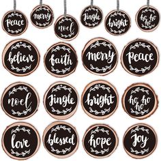 twelve christmas ornaments with the words merry, peace, and joy hanging from strings in black and white