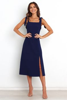 Laurel Dress - Navy - Petal & Pup USA Straight Neckline Dress With Tie Back For Date Night, Fitted Midi Dress With Tie Back And Straight Neckline, Tie-back Midi Dress For Night Out, Chic Midi Length Dresses With Straps, Square Neck Tie Back Dress For Night Out, Fitted Suspender Dress With Tie Straps For Brunch, Elegant Square Neck Midi Dress With Tie Back, Elegant Midi Length Dress With Straps, Party Midi Dress With Straight Neckline And Tie Back