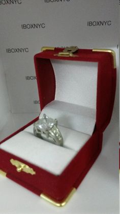 "valentines day proposal Ring / earrings present keepsake gift box Dimensions: 2\" x 21/4\" x 1 3/4\" (H) Red Velvet Engagement Ring Box, Beautiful Bright red Color smooth spun american Velvet Perfect for Lovers Soft Smooth spun White velvet and satin interior pillow design interior hugs and holds ring in place Treasure Chest Design Accented with Faux Gold Brass Corners and Gold strudy snap lock Made of high Quality fine spun Materials Perfect for wedding bands and engagement ring Also good for Round Jewelry Gift With Box, Valentine's Day Gift Rings With Cubic Zirconia, Classic Jewelry Gift With Box Included, Classic Jewelry With Gift Box, Round Cut Jewelry For Valentine's Day Formal, Round Cut Jewelry For Valentine's Day Formal Occasions, Formal Silver Jewelry In Gift Box, Formal Rings With Prong Setting For Valentine's Day, Silver Ring For Formal Occasions And Mother's Day