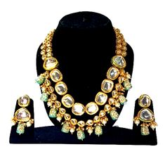 Bollywood Style Beauty - Kundans necklace jewellery set from Victor Choice  Made from high quality kundan. Micro gold plated for high durability. Buyers who purchased this necklace set from Victor Choice really liked this product. This product comes in Victor Choice branded packaging Skin friendly - Nickel free and lead free as per international standards. Anti-allergic and safe for skin Size - Necklace length - 45 cms, earrings length - 3. 8 cms Brand - Victor Choice is a well known brand acros Designer Gold Kundan Necklace, Designer Gold Necklace For Festive Occasions, Designer Gold Necklaces For Festivals, Designer Gold Kundan Necklace For Gift, Designer Gold Necklaces For Festive Season, Designer Gold Jewelry With Meenakari, Designer Kundan Gold Necklace, Festive Designer Gold Kundan Necklace, Designer Kundan Gold Necklaces