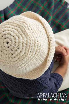 A modern and hip baby bucket hat!  Easy and fun to crochet Playful White Yarn Hat, White Curved Brim Crochet Hat, Cream Crochet Yarn Hat, Playful Brimmed Crochet Hat, Cream Knitted Yarn Hat, Crochet Baby Bucket Hat, Crochet Bucket Hat Pattern, Baby Bucket Hat, Bucket Hat Pattern