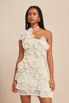 A hand-crocheted, mini-dress with large, three-dimensional knit floral motifs.- Ties behind the neck- Lined- Open knit- One shoulder Dirndl Outfit, Double Layer Dress, Bandeau Tops, Sleeveless Outfit, Knitted Flowers, Fitted Mini Dress, Women Halter, Mini Robes, Mini Dresses For Women