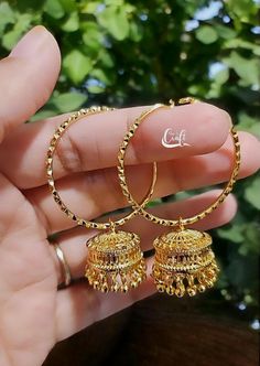 22k Dubai Gold plated Hoop Jhumka Earrings for women.  *jumka length 4.8 CM long and hope size 3 CM Round.   Best Simple Gift for anyone.  Handmade Hoop Earrings are so pretty.  *We Ship SAME Day if you place order between  1 am to 1 pm.  or Next working day from New York city with USPS standard 3-5 working day delivery . ●size  length 5 CM  Round Bell size 1.5/1.4 CM  Note: These are made by human and very traditional way, every single portion are human crafted, so Size will not be point by poi Gold Hoop Jhumkas Temple Jewelry, Elegant 22k Gold Round Jhumkas, Luxury 22k Gold Round Jhumkas, Hallmarked Gold Plated Round Jhumkas, Gold Brass Round Jhumkas, Jumka Earrings, Dubai Gold Jewelry, Handmade Hoop Earrings, Jhumka Earrings