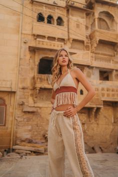 100% Cotton woven & dyed by hand. One size, large elastic in the back. Prints are made by hand. A shell (cowrie) is sewn in the middle of the top. ◦ ँ ◦ Size guide One size fits from XS to L. Bohemian Brown Crop Top, Bohemian Festival Tops With Natural Dye, Bohemian Tops With Natural Dye For Festivals, Bohemian Natural Dye Tops For Festivals, Bohemian Halter Top For Summer Festival, Traditional Boho Print Top For Vacation, Beach Cotton Tops With Back Tassel Tie-up, Traditional Crop Top For Summer Festivals, Bohemian Sleeveless Beige Halter Top