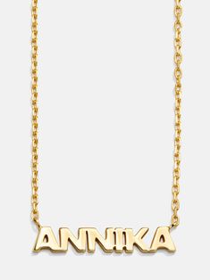 Spell it out with the 18K Gold Mini Nameplate Necklace. This custom name piece features a modern gold chain attached to your choice of a pavé or gold nameplate. Featuring the personalization of your choosing. Crafted with 18K gold plated sterling silver and Cubic Zirconia stones, you'll be wearing it for years to come. Modern Personalized Gold Name Necklace, Modern Gold Personalized Name Necklace, Modern Gold Name Necklace, Luxury Gold Name Necklace With Custom Name, Modern Personalized Yellow Gold Name Necklace, Gold Name Necklace With Cable Chain For Gift, Gold Name Necklace With Cable Chain As Gift, Custom 14k Gold Nameplate Necklace, Luxury Customizable Nameplate Necklaces