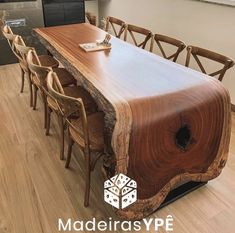 a large wooden table with chairs around it