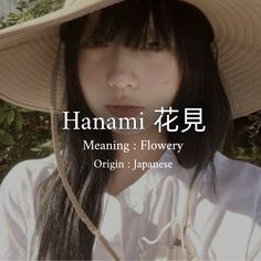 a woman wearing a hat with the words meaning flower origin in japanese