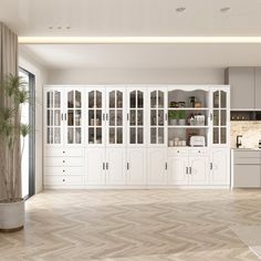 an empty kitchen with white cabinets and wood flooring is pictured in this artist's rendering