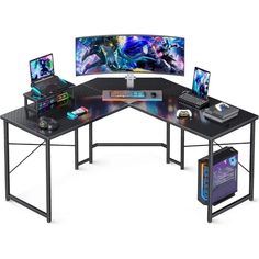 a computer desk with three monitors and two laptops on it, all connected to each other