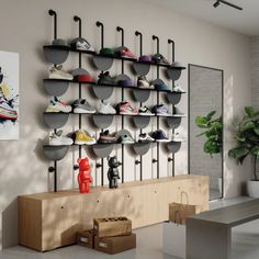 there are many shoes on the shelves in this room