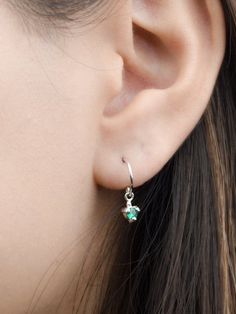 "These emerald hook earrings are the perfect addition to your minimalist earring collection. Our dangle drop earrings are meant to be classic enough for everyday wear or to give as a bridesmaid gift. These birthstone earrings will definitely be a favorite of yours! SOLD AS A PAIR ** PLEASE NOTE: Model is wearing multiple earrings. This listing is for a pair of Emerald Hook earrings only ** At LunaiJewelry, we take pride in the details and love we pour into everything we make. We know you'll find Dainty Earrings Silver, Pendulum Earrings, Shiny Jewelry, Minimalist Earring, Multiple Earrings, Turquoise Hoops, Silver Statement Earrings, Turquoise Drop Earrings, Earring Collection