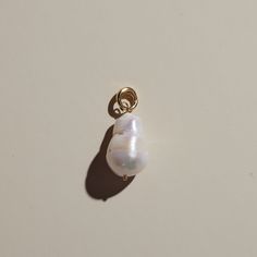 Add this Baroque Pearl Charm to any piece of jewelry for a unique touch! A simple clasp secures your charm to any piece - no sliding required. * Approx. 16mm - 32 mm. Size and shape may vary due to natural shape. Pearl Charm Round Beads For Jewelry Making, Pearl Charm For Jewelry Making, Handmade Minimalist Baroque Pearl Jewelry, Pearl Jewelry With Round Bead Charms, Classic Pendant Jewelry With Lobster Clasp, Pearl White Round Beads Jewelry For Everyday, Elegant Pearl Charm For Everyday, Elegant Pearl Charm, Elegant Everyday Pendant Charms