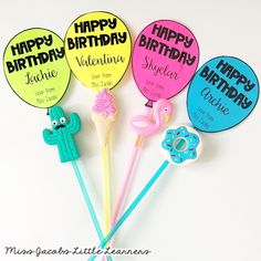 four birthday lollipops with flamingos and ice cream on them are shown