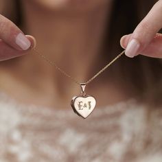 "Our Floral Wedding Initials Heart Locket makes a stunning gift for any happy couple. The design features a beautiful engraved floral design interwinted around your chosen initials. Choose from two initials with an ampersand in the middle. Personalise the back of the locket with a special date or word. This necklace makes the perfect wedding, anniversary, or special birthday gift. Handmade in our Brighton studio from the finest sterling silver. *We can now print your chosen photos in-house and m Heart-shaped Wedding Necklace With Engraving Option, Heart Shaped Wedding Necklace With Engraving Option, Engravable Heart Pendant Jewelry, Heart Pendant Necklace With Engraving Option For Wedding, Heart Pendant Jewelry With Engraving Option For Gift, Personalized Double Heart Jewelry With Initials, Personalized Initials Double Heart Jewelry, Personalized Double Heart Initials Jewelry, Wedding Heart Pendant Jewelry With Engraving Option