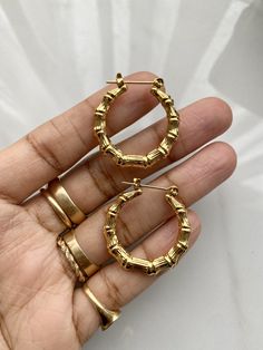 Gold plated stainless steel hoops Model is wearing size 2” Big Bamboo, Gold Drip, Bamboo Hoop Earrings, Bamboo Earrings, Trending Necklaces, Coin Pendant Necklace, Gold Cross Necklace, Jewelry Accessories Ideas, Jewelry Lookbook