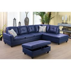 a blue leather sectional sofa with ottoman and footstool