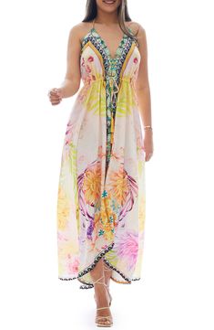 An intricate pattern with a bold palette adds eye-catching appeal to a cover-up dress crafted from lightweight fabric for easy movements. Halter neck Sleeveless 100% polyester Hand wash, dry flat Imported Model stats: 5'10" height, 32" bust, 25" waist, 36" hip. Sleeveless Printed Maxi Dress Beach Cover-up, Sleeveless Tropical Cover-up For Beach Party, Tropical Sleeveless Cover-up For Beach Party, Tropical Sleeveless Beach Party Cover-up, Multicolor Floral Print Sundress For The Beach, Vibrant Print Sleeveless Vacation Dress, Sleeveless Tropical Spring Cover-up, Vibrant Summer Sundress For The Beach, Vibrant Summer Beach Sundress