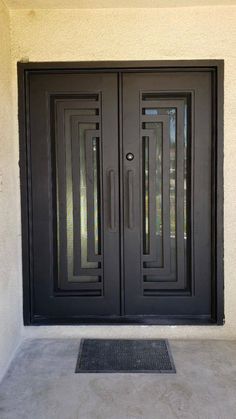 a black double door with two sidelights