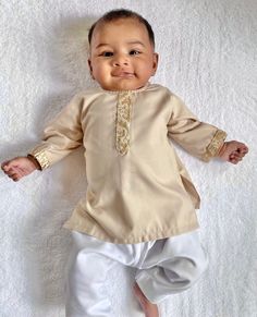 Eid orders will close on Monday, April 25, 2022 at 11:59pm ET. All orders placed after this time will be fulfilled after the Eid holiday. Shalwar / Pajama / Trouser sold separately: https://www.etsy.com/listing/771659464/infant-toddler-baby-shalwar-pajama?ref=shop_home_active_6&crt=1 Adorable, made-to-order kurta for infant, toddler and kid boys! Kurta ➤ Breathable and easy-to-wash cotton fabric ➤ Easy open and close clasp-buttons ➤ No-itch collar and sleeves ➤ Wide neck to easily fit over baby' Unstitched Festive Pant Set For Eid, Unstitched Pant Set For Eid Festivities, Festive Dabka Work Pant Set For Eid, Unstitched Pant Set For Eid Festival, Dabka Pant Set For Eid, Wedding Festivals Pant Set With Straight Kurta, Bollywood Style Pant Set For Weddings And Festivals, Bollywood Style Wedding Pant Set For Diwali, Bollywood Style Wedding Pant Set For Festivals