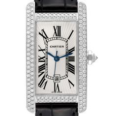 Cartier Tank Americaine White Gold Diamond Ladies Watch 2490. Automatic self-winding movement. 18K white gold case 22.0 x 41.0 mm. Octagonal crown set with an original Cartier factory diamond. Original Cartier factory double-row diamonds lug to lug. 18k white gold bezel with original Cartier factory double-row diamonds. Scratch resistant sapphire crystal. Silvered guilloche dial with black Roman numerals. Blued steel sword shaped hands. Secret Cartier signature at VII. Date window at 6 o'clock. Cartier Diamond Watch With Brilliant Cut, Timeless Cartier Diamond Watch With Palladium Hardware, Cartier Diamond Watch With Diamond Hour Markers For Anniversary, Classic Diamond Watch With Palladium Hardware, Timeless Cartier Diamond Watch In Platinum, Cartier White Gold Watch With Brilliant Cut, Cartier Silver Diamond Watch With Brilliant Cut, Classic Platinum Diamond Watch With Diamond Hour Markers, Cartier Diamond Watch In Silver