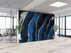 an office with a large wall mural in the middle