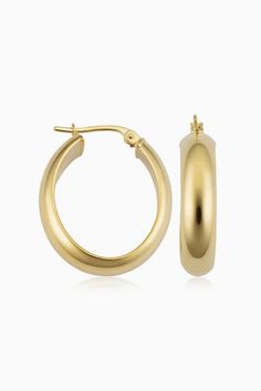 Radiant. Bold. Timeless. Oval. Our High Society Hoops are a must-have for every fine jewelry collection. The wide, flattened solid gold tubes give them a classic, vintage feel, while the curved design creates a dome effect for maximum shine. Metal: 14 Karat Yellow Gold Dimensions: 5.7mm Width, 14mm Diameter Construction: Hollow Tubing, Latch Closure Weight: 2.7 Grams Origin: Crafted in Arezzo, Italy Arezzo Italy, High Society, Fine Jewelry Collection, Classic Vintage, Solid Gold, Jewelry Collection, Fine Jewelry, Jewelry Earrings, Yellow Gold