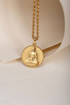 Welcome to PoshGoldJewelry, Our collection of round pendants with unique designs on top are made for both men and women. Our Buddha necklace can be personalized on the back with a custom message of your choice. Pendant Thickness: 0.6mm Rope Chain Thickness: 2.10mm Material: - 14K Real Solid Gold A hallmark (stamp) of the material of your pendant will be included on the back for certification. - Gift Box with each order! ✔️ You can contact us for the creation of your custom pendant. ✔️ Contact us Spiritual Coin-shaped Jewelry With Large Pendant, Spiritual Medallion Jewelry For Anniversary, Spiritual Medallion Necklace With Large Round Pendant, Spiritual Engraved Round Jewelry, Personalized Spiritual Medallion Necklace, Symbolic Jewelry With Round Locket Pendant, Spiritual Jewelry With Coin Pendant In Round Shape, Spiritual Jewelry With Round Coin Pendant, Symbolic Round Pendant Locket Jewelry