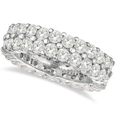 a white gold ring with round diamonds