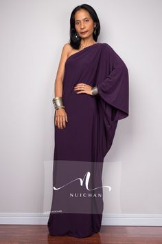 One shoulder dress, Long dark purple formal dress, Off shoulder evening dress, eggplant purple cocktail dress, Christmas gala party dress, purple kaftan dress PRODUCT SIZE : One Size Fits most * Chest : 40" will stretch to 44" * Waist : 40" will stretch to 44" * Hips : 40" will stretch to 44" * Sleeve length : 23" * Length : 57" - 58" from shoulder to hem (measured when laying flat) MATERIAL : * ITY (polyester jersey) > soft and comfortable to wear, not as slippery as spandex. NOTE :  * Model chest : 32", waist : 24" hips : 35"  * Combined Height is 5"6 > I'm 160 cm (5"2) and I'm wearing 4" heels in the pictures * Accessories excluded  CARE INSTRUCTIONS :  * Wash separate in Cold water * Hand wash recommended * Hang to dry   IMPORTANT NOTE  *Please note that colours shown on your monitor m Dark Purple Formal Dress, Formal Dress Purple, Purple Kaftan, Long Purple Dress, Purple Formal Dress, Purple Party Dress, Purple Long Dress, One Shoulder Dress Long, Combination Dresses