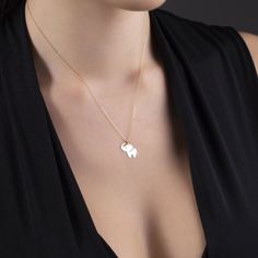 Introducing our stunning 14k Gold Elephant Necklace, a symbol of strength, wisdom, and grace. This exquisite piece is meticulously crafted for women who appreciate timeless elegance. Made with love and attention to detail, this necklace showcases a beautifully detailed elephant pendant, symbolizing good luck and positive energy. The delicate 14k gold chain adds a touch of glamour, making this necklace a versatile accessory that can be worn for any occasion. Treat yourself or surprise a loved one Dainty 14k Stamped Jewelry, Dainty Engraved Jewelry For Formal Occasions, Dainty Engraved Formal Jewelry, Delicate Engraved White Gold Jewelry, Delicate Personalized Jewelry For Formal Occasions, Graceful Round Gold Jewelry, Graceful Yellow Gold Jewelry For Anniversary, Personalized Formal Delicate Jewelry, Delicate Everyday Jewelry Stamped 14k