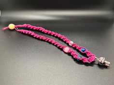 Handmade Usa Item * HEMP COLOR: pink *  Type: Necklace SPIRAL 18 inches long  * Materials: Smooth Blue Tiger Eye Stone, Natural Pink Quartz Stone, Black Veined Rhodonite Mushroom, Pink rope * Jewelry Style: Boho & hippie FAST SHIPPING  ✉️ 🇺🇸 Macramé hemp jewelry is a unique and stylish accessory that combines the art of macrame knotting with the natural beauty of hemp fibers. Handcrafted with care and attention to detail, each piece of macramé hemp jewelry is a work of art that adds a bohemian and earthy touch to any outfit. The use of hemp fibers in macramé jewelry not only adds a rustic and organic feel but also makes it an eco-friendly choice. Hemp is a sustainable and renewable material that requires minimal water and pesticides to grow, making it an environmentally conscious option Handmade Pink Crystal Necklace As Gift, Handmade Pink Crystal Necklace For Gift, Adjustable Pink Jewelry For Festivals, Handmade Spiritual Pink Beaded Necklaces, Handmade Pink Spiritual Beaded Necklace, Pink Spiritual Pendant Crystal Necklace, Spiritual Pink Pendant Crystal Necklace, Unique Pink Jewelry For Festivals, Spiritual Adjustable Necklace For Festivals