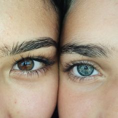 two people with blue eyes are looking at the camera