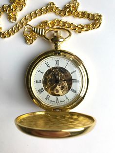 Masonic skeleton movement pocket watches in gold or silver plated with pewter handcrafted centre piece perfect gift for mason and Masonic meetings Vintage Skeleton Dial Pocket Watch As Gift, Timeless Gold Watch For Gift, Timeless Gold Watch As A Gift, Timeless Gold Watch As Gift, Antique Quartz Pocket Watch As Gift, Timeless Gold Watch Accessories As A Gift, Antique Quartz Pocket Watch Gift, Gold Pocket Watch With Skeleton Dial, Antique Pocket Watch As Gift