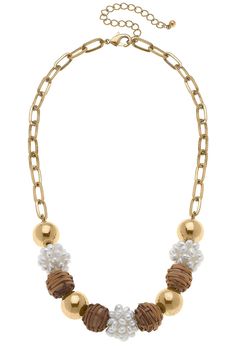 Enhance your look with this classic, yet unique Bella Pearl Cluster & Wicker Ball Bead Necklace in Brown. This artisanal jewelry piece combines a timeless elegance with a touch of exotic flair from the wicker-style ball bead, all to create a one-of-a-kind look. The rich tones of brown evoke a sense of tropical warmth, so you can add the perfect hint of sophistication to any outfit. DETAILS: Base Metal with Worn Gold Plating Wicker & Pearls 18" Adjustable Length Resort Chic, Brown Outfit, Pearl Cluster, Dog Daycare, Outfit Details, Base Metal, Bead Necklace, Artisan Jewelry, Gold Plating