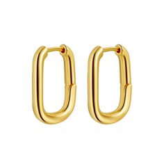 the gold earrings are made from metal and have an oval design on each earring