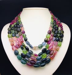 100 % Natural Multi Tourmaline carved oval shape beaded necklace with adjustable silk cord closure. Details: - Gemstone - Multi Tourmaline Shape - Oval Strand - 5 Calibration of beads - 8x10 millimeters till 13x18 millimeters Gross weight - 1442.50 carat Net weight - 1404.00 carat Length - 20 Inches ( Inner ) and 24 Inches ( Outer ) SKU - HJSPSAR0077 100% NATURAL MULTI TOURMALINE NOT HEATED NOT TREATED NOT DYED VERY RARE NECKLACE TO FIND EACH BEAD IN THE NECKLACE IS PERFECTLY HAND CARVED BY BEST Cheap Multi-strand Polished Bead Necklaces, Luxury Beaded Necklaces With Large Oval Beads, Luxury Multi-strand Necklace With Colorful Beads, Luxury Necklaces With Large Oval Beads, Luxury Unique Necklace With Oval Beads, Luxury Multicolor Elegant Beaded Necklaces, Cheap Multi-strand Statement Beaded Necklaces, Luxury Multi-strand Beaded Necklaces For Party, Luxury Artisan Multi-strand Beaded Necklace