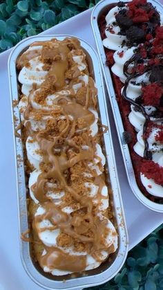 two trays filled with ice cream and dessert