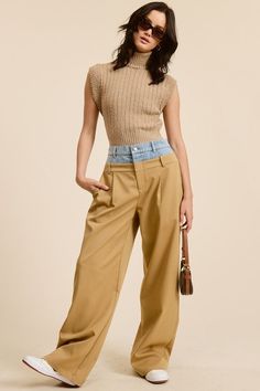 Transform your wardrobe with our Taupe Billie Trousers - the perfect combination of casual and dressy. These unique trousers feature a playful Peek-a-boo denim wash waistband and functioning front pockets. Style with a sleek top for a trendy and practical fashion statement. Each piece is one-of-a-kind due to the Denim Wash Waistband. PRE-ORDER 07/12/24 Fabric & fit:SELF: 69% POLYESTER 29% RAYON 2% SPANDEXCONTRAST: 100% COTTON Model is wearing size small. Unique Trousers, Practical Fashion, Swimwear Sale, Peek A Boo, Denim Wash, Fashion Statement, Pre Order, Sleek, Trousers