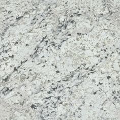 a white marble counter top with black and gray speckles on the bottom half