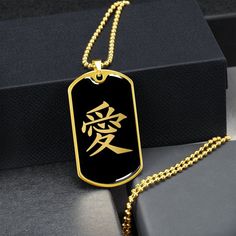 "The Chinese Kanji Love Character necklace Is the Perfect Gift Whether for Yourself or a Loved One. Explore all our sacred geometry jewelry here: https://www.etsy.com/in-en/shop/SymbolicPresent?ref=simple-shop-header-name&listing_id=877238359§ion_id=22613481 ➜This pendant ideal for men and women. ➜ Our jewelry is made of high-quality surgical steel with a shatterproof liquid glass coating and an 18k gold finish option. ➜ Engrave onto the back of the Chinese Kanji Love Character pendant your love Black Pendant Jewelry For Blessing, Spiritual Engraved Dog Tag Jewelry, Spiritual Black Necklace, Black Spiritual Necklace For Blessing, Spiritual Black Necklace For Blessing, Symbolic Dog Tag Necklace As Gift, Personalized Spiritual Necklace With Rectangular Pendant, Personalized Black Spiritual Necklaces, Personalized Spiritual Black Necklaces